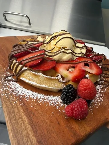 Golden crispy waffles with syrup